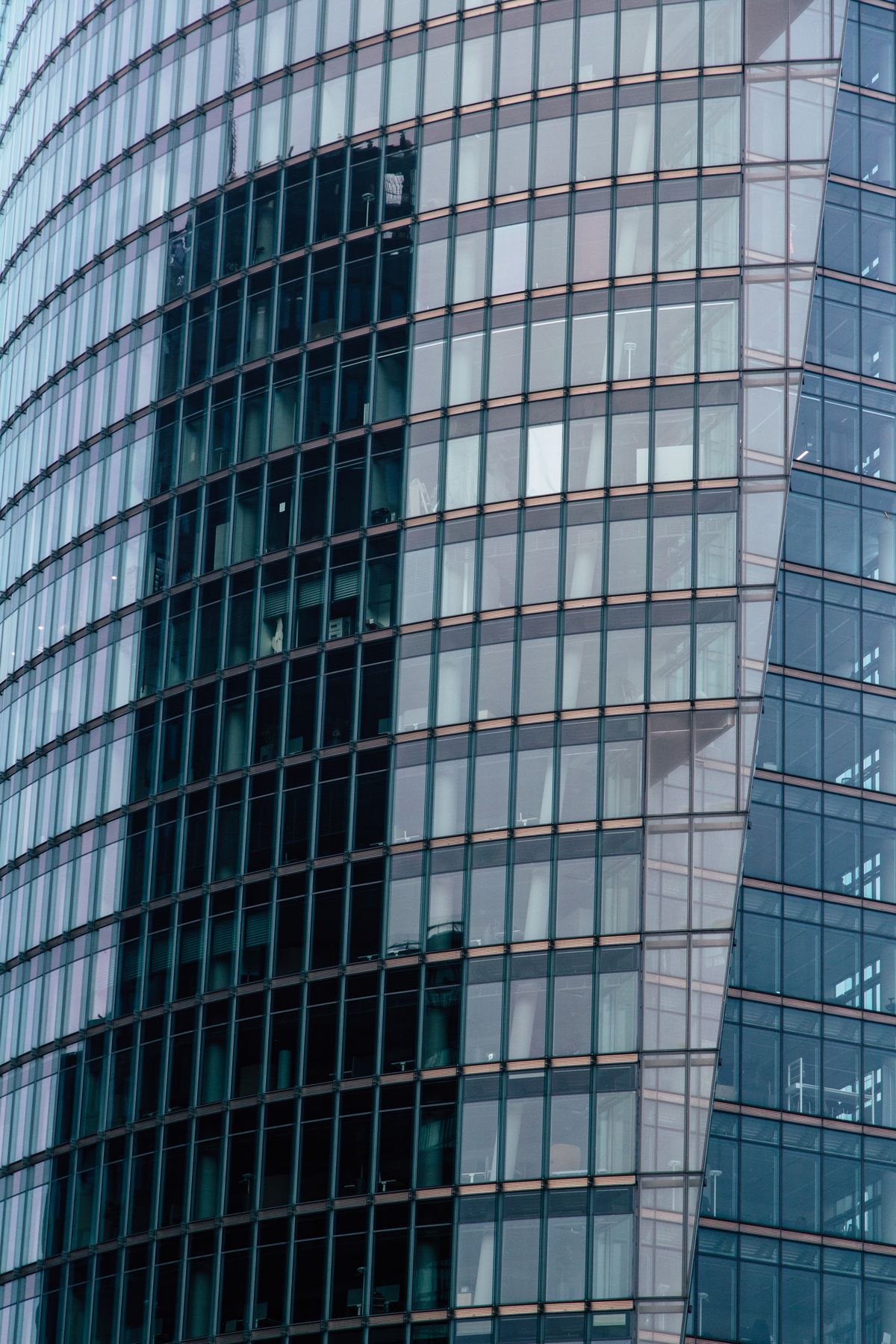 Modern commercial office building with a reflective glass facade